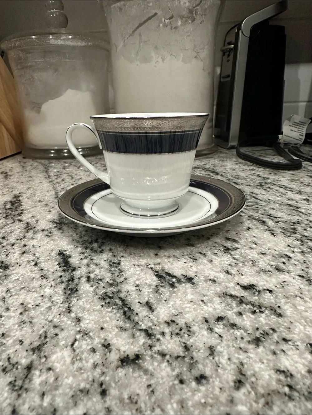 Noritake White and Navy Porcelain Teacup with Saucer